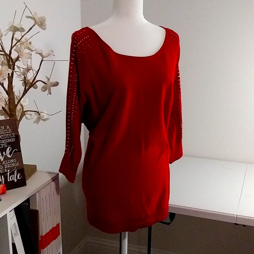 Red sweater with silver studded accents